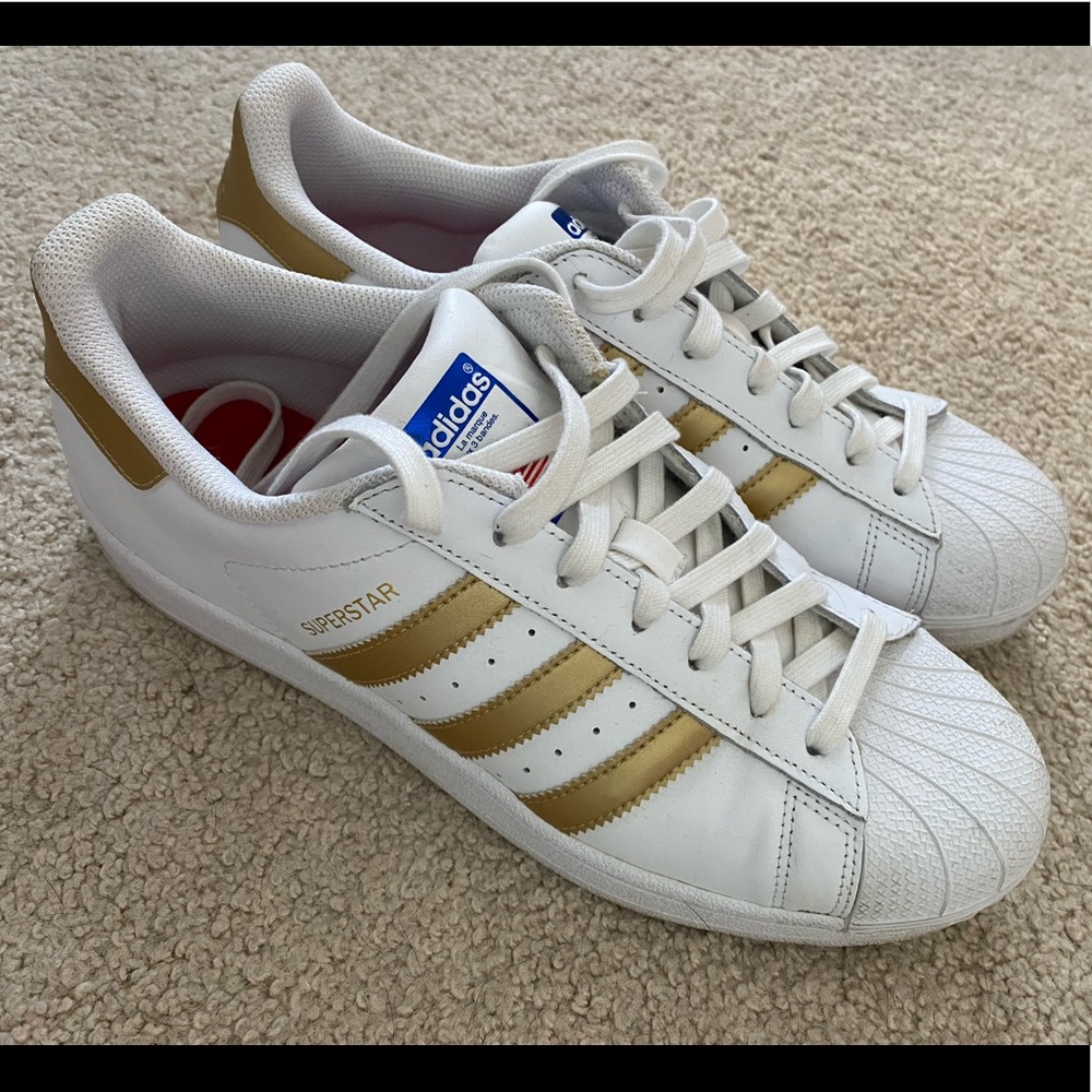 Gold adidas original superstar shoes